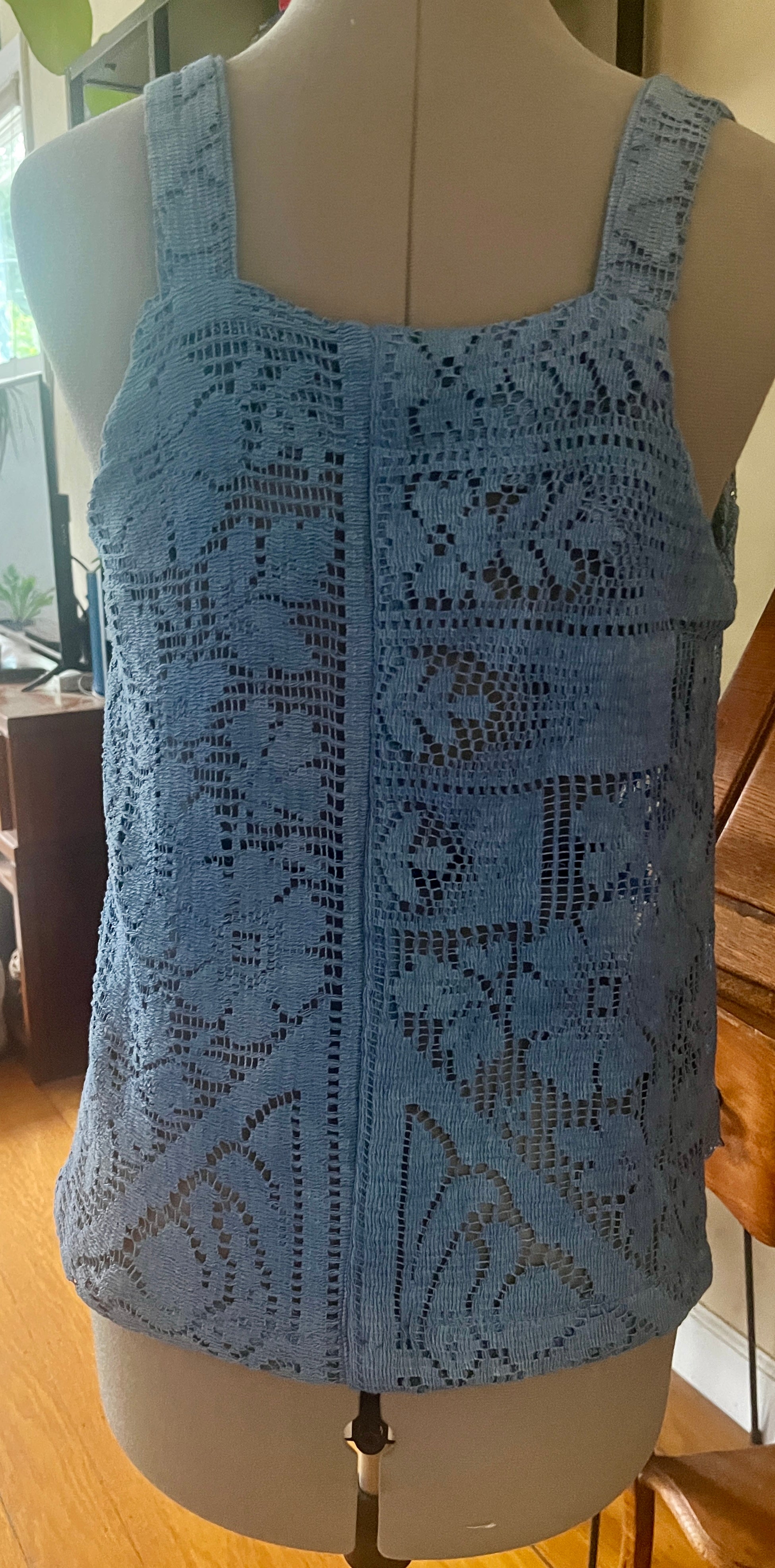 Blue lace tank top with straps and trapeze shape